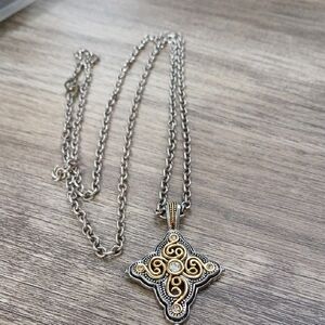 Elegant Gold and Silver Pendant Necklace